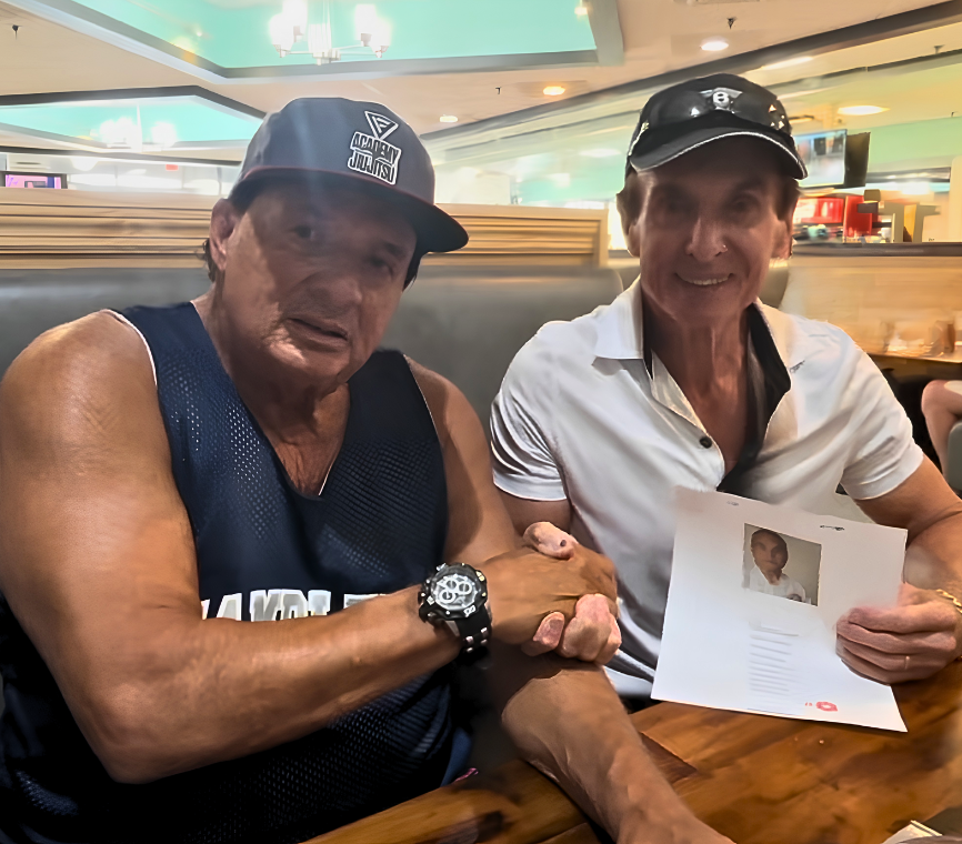 Carlos Valenta And Roger Shorr Shaking Hands