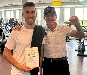 Federico And Roger With New Book Home